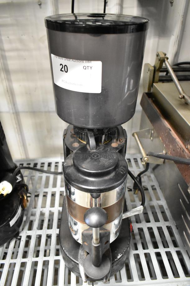 Rossi RR45 metal commercial espresso bean grinder, 115 volts, 1 phase, labeled, in good condition on metal countertop.