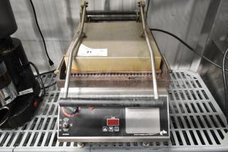 Star CG14IT stainless steel commercial panini press, 120 volts, 1 phase, countertop model, with control panel and timer.