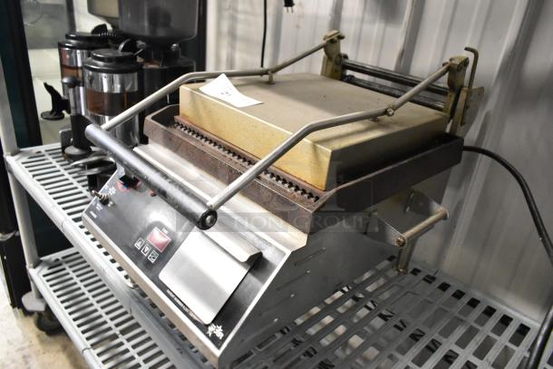 Star CG14IT stainless steel commercial countertop panini press. 120 volts, 1 phase, sturdy design, good condition.