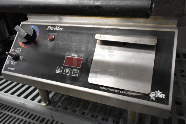 Star CG14IT stainless steel panini press, countertop model, 120V, 1 phase, digital controls, minor wear visible, patent number 6,257,126.