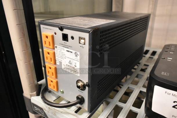 APC UPS and Powervar ABCEG251-11 Power Conditioner; inputs, outputs, labels visible; good condition; auction includes both.