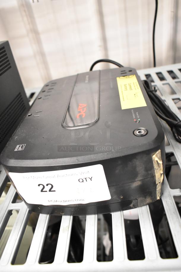 APC UPS and Powervar ABCEG251-11 power conditioner, worn condition, auction lot with item tag visible.