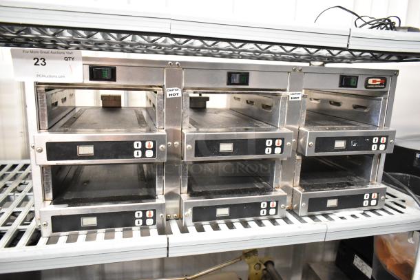Carter Hoffmann MC3W2SN01 stainless steel holding bin, countertop model, 120 volts, dual temperature controls, good condition.