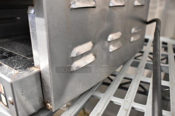 Carter Hoffmann MC3W2SN01 stainless steel countertop holding bin, visible vents and power cord, used condition. 120V, 1 phase.