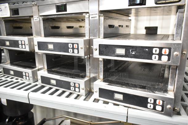 Carter Hoffmann MC3W2SN01 stainless steel holding bin, countertop model. Features control panel with temperature display. Signs of use. 120 volts.
