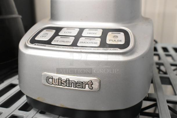 Cuisinart SPB-650 blender base, showing controls: on/off, low, high, ice crush, smoothie, pulse. Silver finish, visible brand logo.