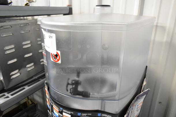 Taylor X83684-12 metal countertop frozen beverage mixer, clear container, visible controls, excellent condition.