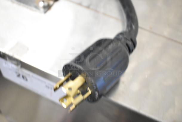 Alt text: Close-up of the plug for a Bunn IMIX-5 Stainless Steel Commercial Cappuccino Machine. 120/208-240V, 1 Phase.