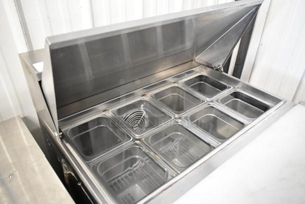 2016 Atosa MSF8301 stainless steel prep table, Bain Marie top, on casters. Features multiple compartments, 115V, 1 Phase.