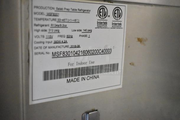 2016 Atosa MSF8301 stainless steel sandwich prep table label, showing model, voltage, refrigerant type, and manufacture date.