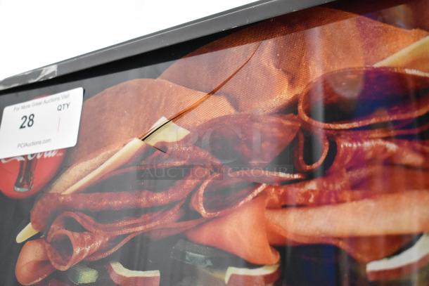 True GEM-26 single door cooler merchandiser with poly-coated racks, minor scratches visible on the exterior graphic panel.