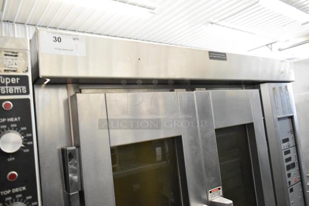 Baxter stainless steel commercial rotating rack oven with double pan rack and casters, natural gas powered, model in good condition.