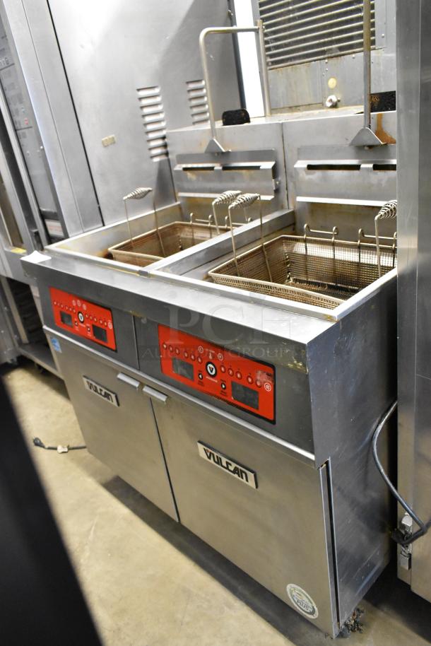 Vulcan 2TR65CF stainless steel commercial deep fryer, 70 lb capacity, natural gas, 160,000 BTU, with filtration, on casters.