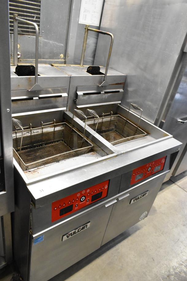 Vulcan 2TR65CF stainless steel commercial deep fat fryer, 70 lb capacity, 2 bay, with filtration system, on casters.