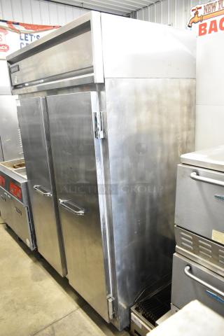 Continental 2R Stainless Steel Commercial 2 Door Reach In Cooler w/ Poly Coated Racks on Commercial Casters. 115 Volts, 1 Phase. - Item #1205234