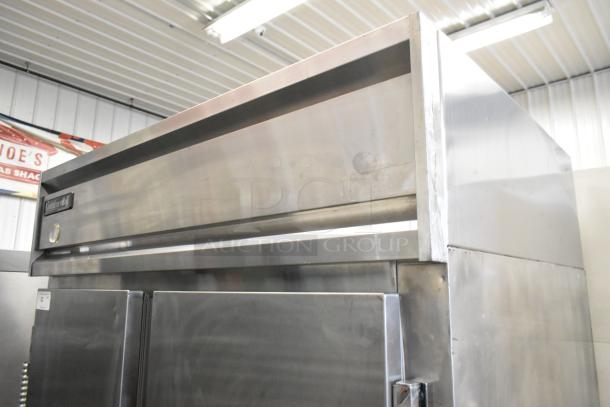 Continental 2R stainless steel 2-door commercial cooler with poly-coated racks and casters. 115V, 1-phase.