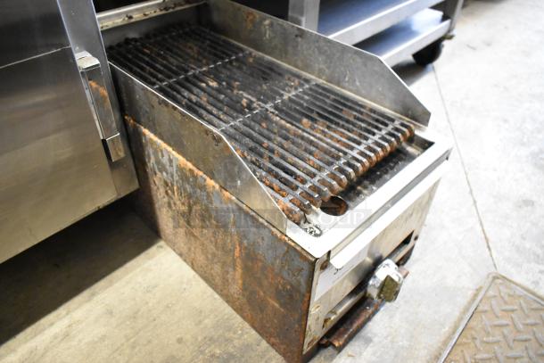 Stainless steel commercial countertop gas charbroiler grill, used, showing rust and wear. Ideal for high-volume cooking.