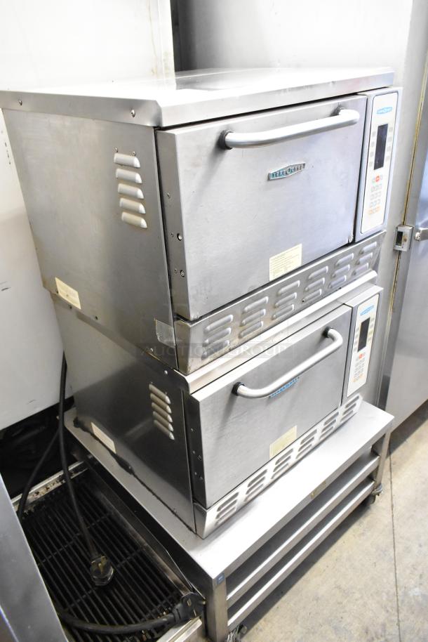 2 Turbochef NGC stainless steel rapid cook ovens on a stand with casters, 208/240V, 1 Phase, commercial use.
