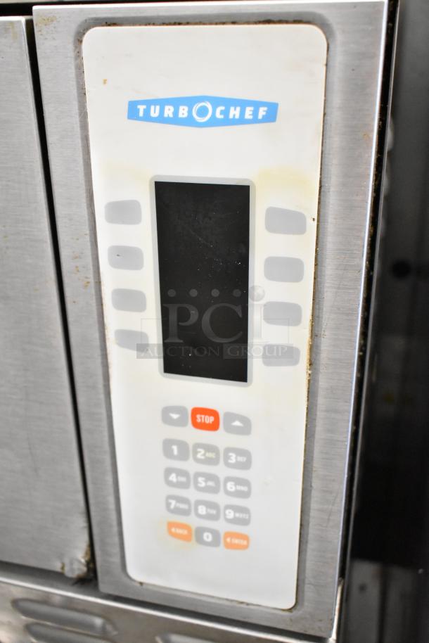 Turbochef NGC stainless steel rapid cook oven keypad with visible brand logo, on an equipment stand.