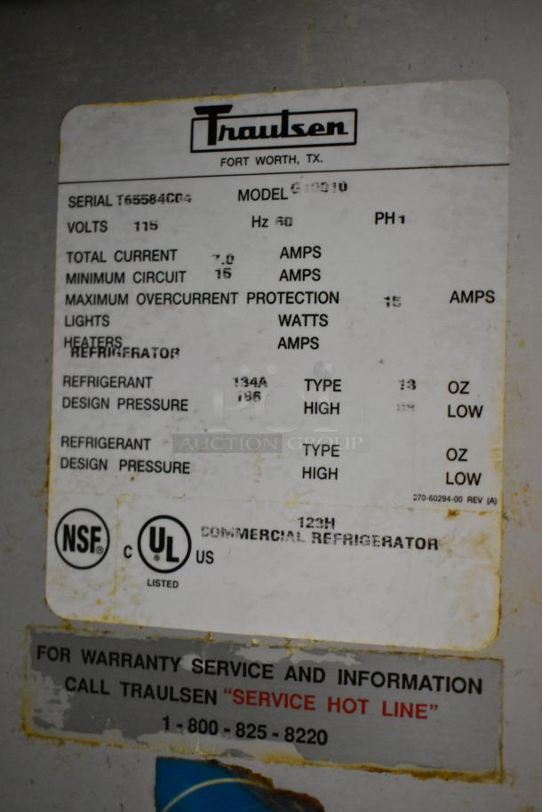 Traulsen G10010 label showing serial T655846C04, 115 volts, 1 phase, NSF and UL listed, warranty contact info.