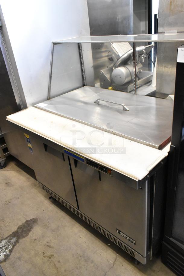 Everest EPBR2 stainless steel commercial prep table with sneeze guard and casters; 115V, 1 phase, good condition.