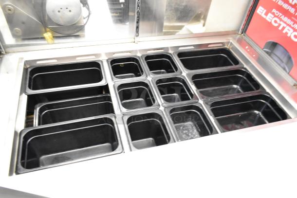 Everest EPBR2 stainless steel prep table with sneeze guard, commercial casters, black food pans shown. 115V, 1 phase.