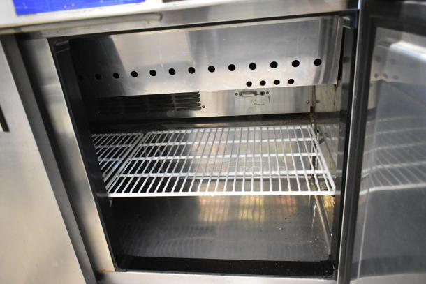 Everest EPBR2 stainless steel prep table with sneeze guard, commercial casters. 115V, 1 Phase, excellent condition.