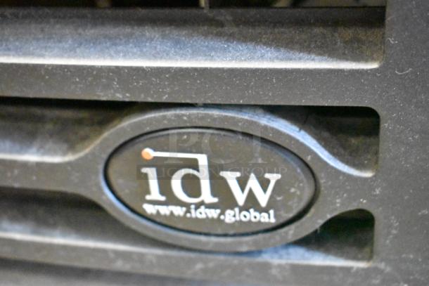 IDW GCG-10-F334B cooler label close-up, showing www.idw.global site, on metal commercial single door cooler, 115V.
