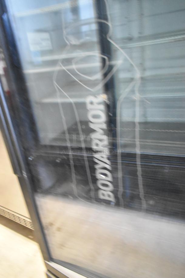IDW GCG-10-F334B single door cooler merchandiser, poly coated racks, "BODYARMOR" branding, used condition, 115V, 1 phase.