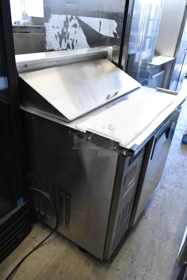 Everest EPR1 stainless steel sandwich salad prep table with commercial casters, used condition, 115V, 1 phase.