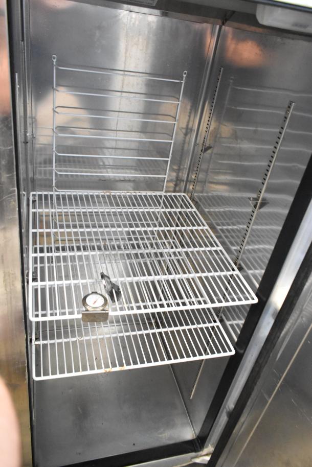 Everest ESR1 commercial cooler, single door, stainless steel, poly coated racks, on casters, 115V, 1 phase.