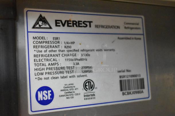 Everest ESR1 stainless steel cooler label showing model, electrical specs, and certifications, emphasizing commercial use.