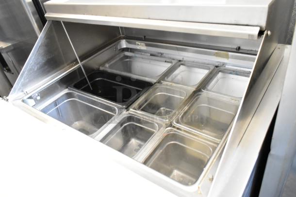 Randell 941452D7 stainless steel prep table, featuring bain marie with 2 drawers, commercial casters, 115V, 1 phase.