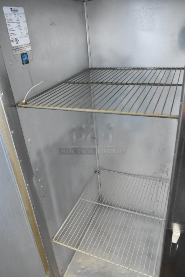 Traulsen G20010 stainless steel 2-door reach-in cooler with poly-coated racks, on commercial casters, 115V, 1 phase.