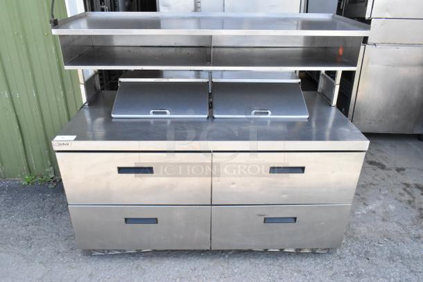 Delfield UCD4464N-12-DD stainless steel commercial sandwich prep table with 4 drawers, overshelf, and casters.