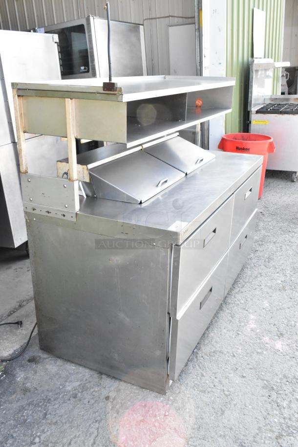Delfield UCD4464N-12-DD stainless steel sandwich prep table with 4 drawers, over shelf, on casters, commercial use.