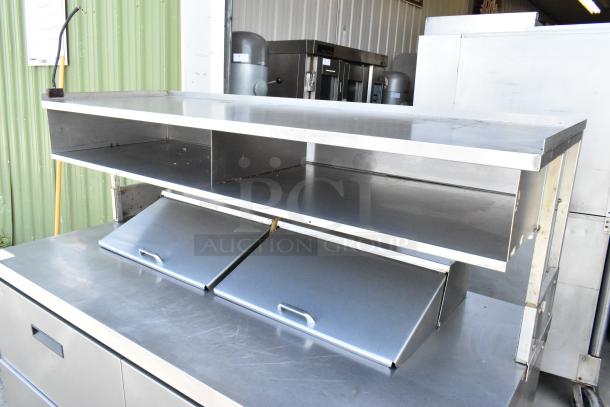 Delfield UCD4464N-12-DD stainless steel sandwich prep table, 4 drawers, over shelf, on casters, 115V, 1 phase.