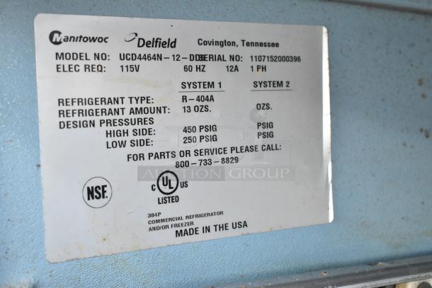 Delfield UCD4464N-12-DD label with model, voltage, refrigerant info, NSF and UL certifications, made in USA.