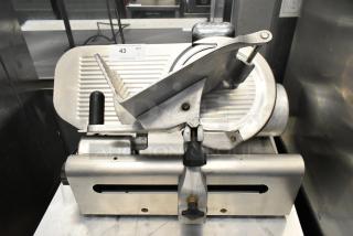 Globe 400 Stainless Steel Commercial Countertop Meat Slicer w/ Blade Sharpener. 115 Volts, 1 Phase. - Item #1205245