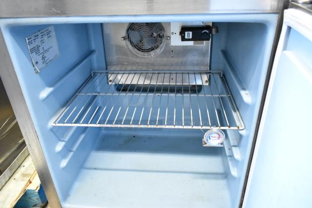 Delfield 406CA-DD1 stainless steel commercial single door undercounter cooler, 115 volts, 1 phase, interior view.