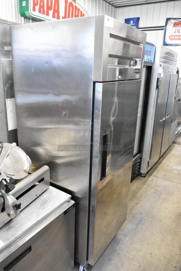 Dukers D28AF stainless steel single door reach-in freezer with poly-coated racks, commercial casters, 115V, 1 phase.