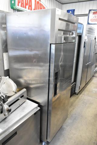 Dukers D28AF stainless steel single door reach-in freezer with poly-coated racks, commercial casters, 115V, 1 phase.