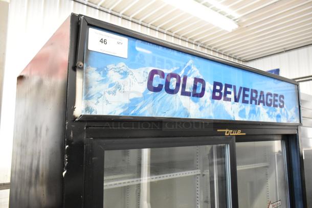 True GDM-41 commercial cooler; 2 glass doors, poly-coated racks, on casters; features "Cold Beverages" branding.