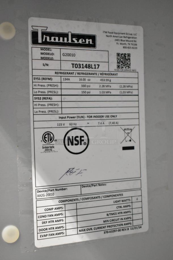 Traulsen G20010 label, stainless steel 2-door cooler, 115V, poly coated racks, commercial casters, NSF certified.