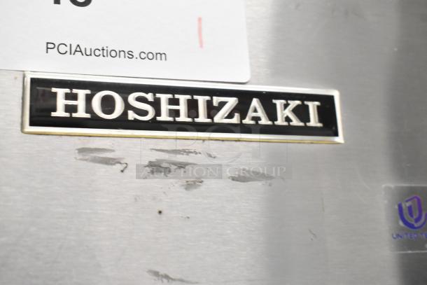 Hoshizaki KML-631MAH commercial ice head on bin, stainless steel, 208-230V, 1 Phase. Hoshizaki label visible.