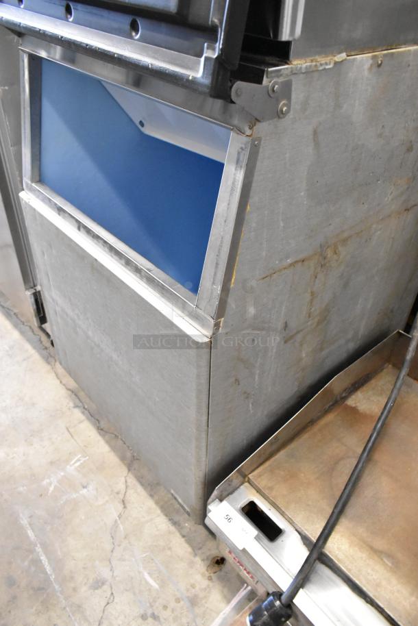 Hoshizaki KML-631MAH stainless steel commercial ice head on a bin; 208-230V, 1 phase; visible exterior wear.