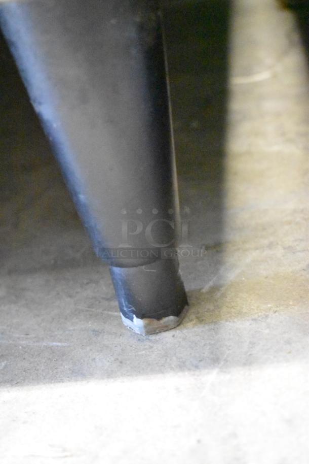 Close-up of an ice bin leg showing wear. Part of Hoshizaki KML-631MAH Commercial Ice Head setup. 208-230V, 1 Phase.