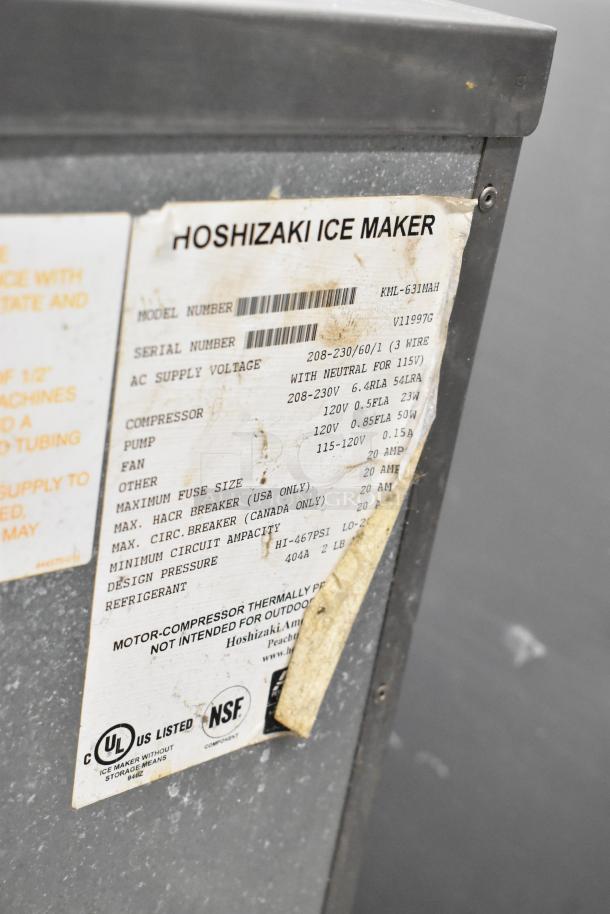 Hoshizaki KML-631MAH stainless steel ice head on commercial bin, 208-230V, 1 Phase. Label indicates model, voltage, certifications.