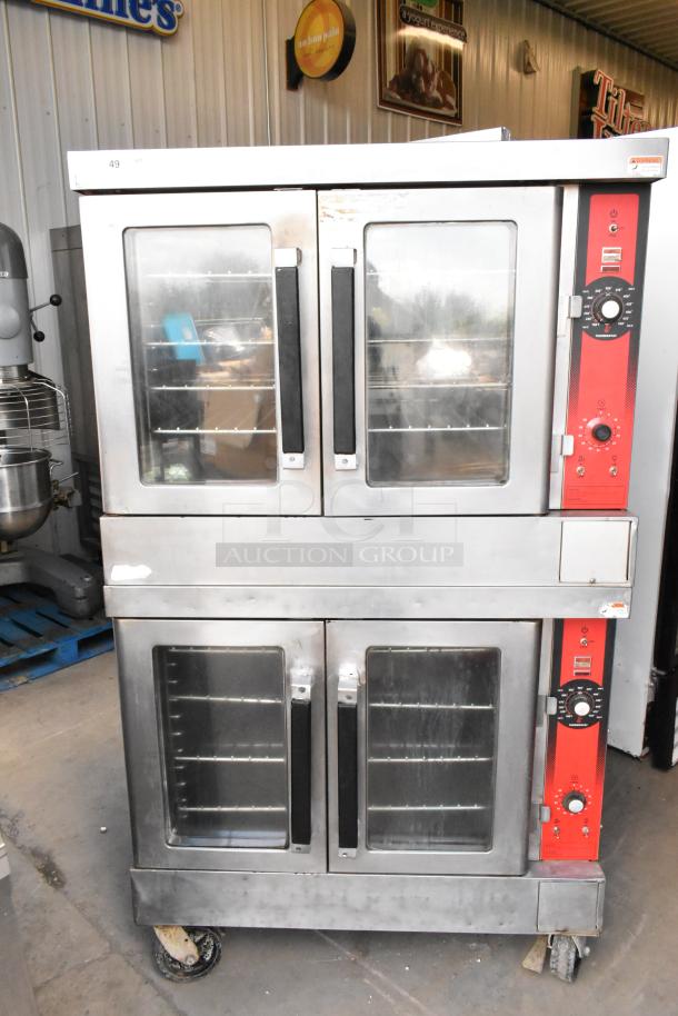 Vulcan VC4GD stainless steel commercial gas convection oven, view-through doors, metal racks, thermostatic controls, on casters.