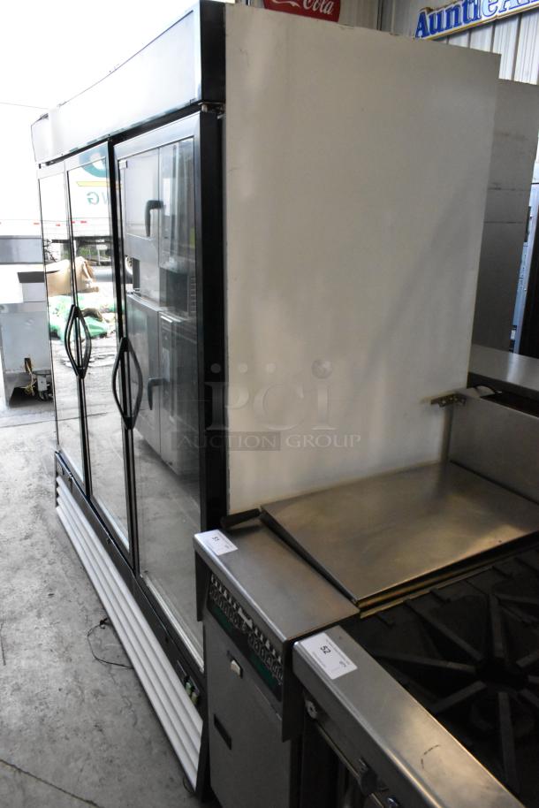 Kool-It KGF-72 commercial 3-door cooler, metal finish, poly-coated racks, 115 volts, 1 phase, excellent condition.